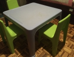 Plastic table and 3 chairs for kids